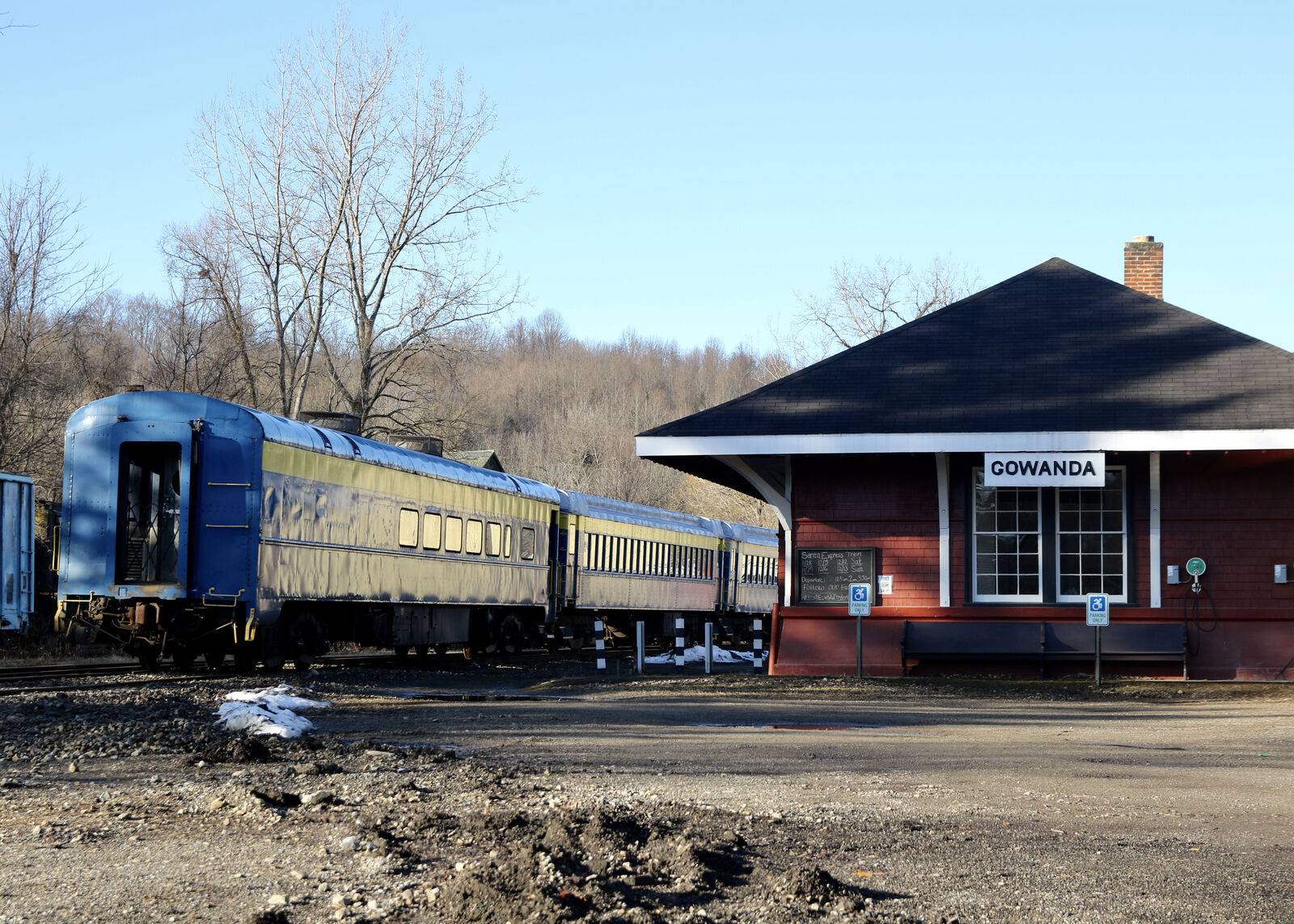 Historic Gowanda train station with vintage rail cars
