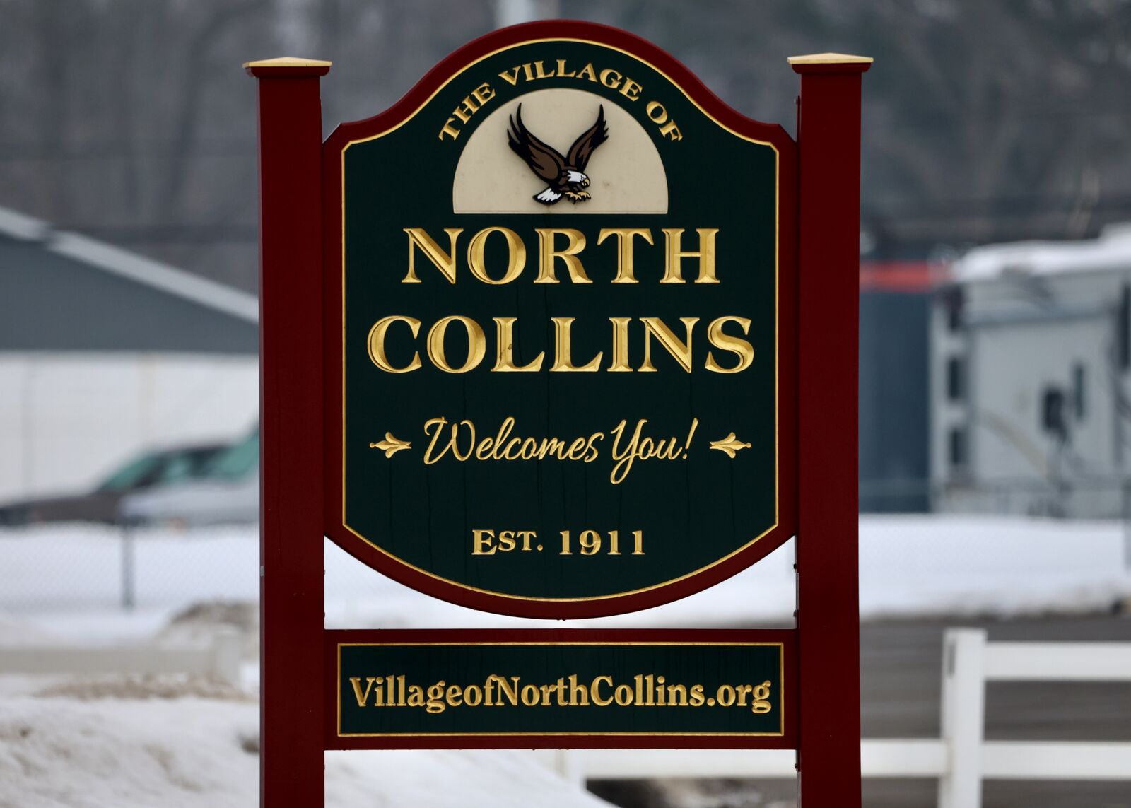 Village of North Collins welcome sign — Established 1911 — with eagle emblem